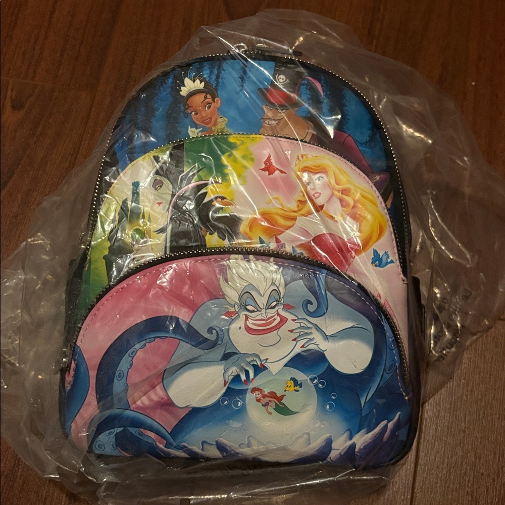 Loungefly | Disney Princess & Villain Scenes Mini Backpack.